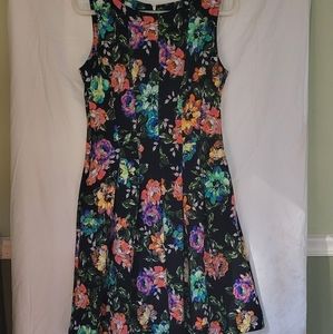 Metaphor Floral sleeveless dress; size 10; black background with floral print.